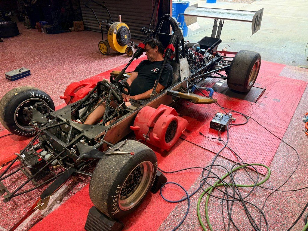 Open-wheel car on the dyno floor