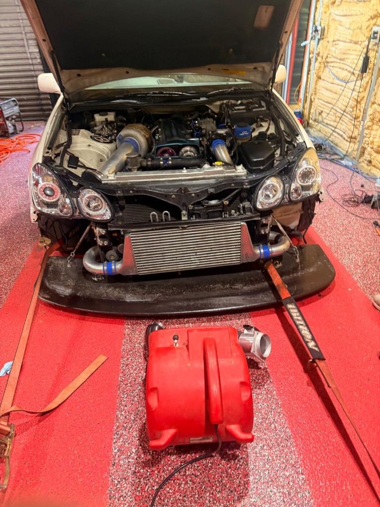 Turbocharged car on the dyno at NC Diesel and Dyno